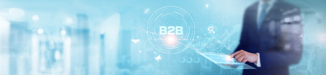 B2B (Business to Business): Businessman using tablet and analyzing data, market trends, client...