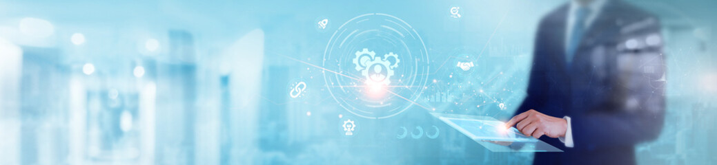 Business Administration: Businessman using tablet and analysis data on project management, resource...
