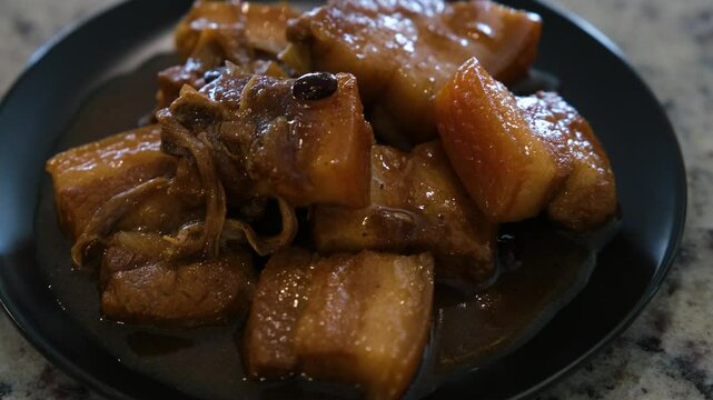 Authentic Filipino pork adobo recipe featuring tender pork and spices