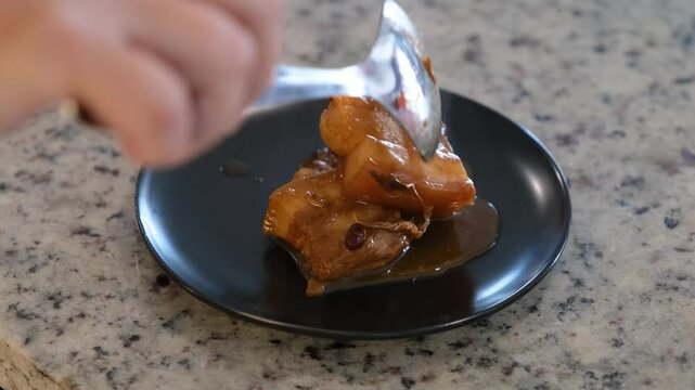 Authentic Filipino pork adobo recipe featuring tender pork and spices