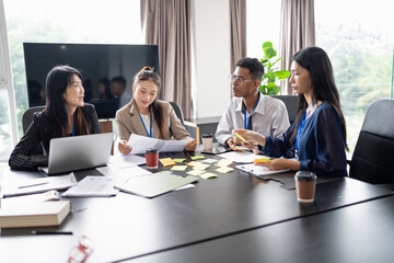 Business asian Multicultural businesspeople working project  working together in office conference ideas in startup at office Diversity leadership and business people