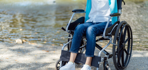 Obraz premium Depressed sad asian woman in wheelchair&nbsp;lonely disabled adult