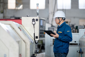 asian male engineer working in factroy