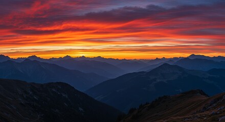Obraz premium The sky is painted with a beautiful orange and pink hue, creating a serene