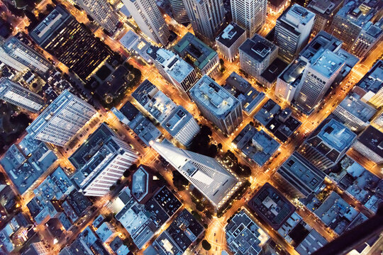 Top down aerial of streets and buildings at night, San Francisco, California