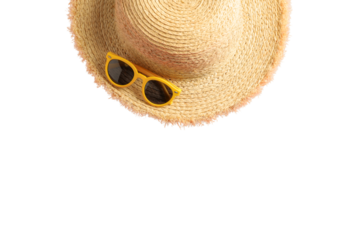 Bright straw hat sits alongside yellow sunglasses for sun protection, isolated on white, PNG