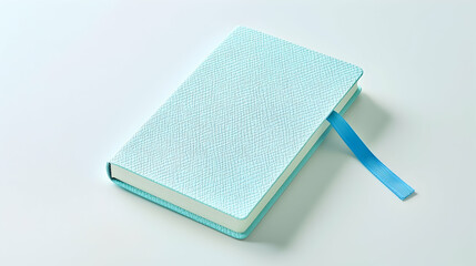 Light blue notebook on white background, ideal for education, planning, or journaling