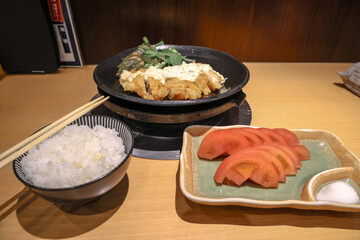 Traditional Japanese Meal with Rice, Sliced Tomatoes