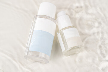 Showcase of skincare bottles on the water