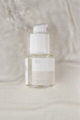 Showcase of skincare bottles on the water