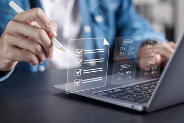 Online exam concept, Online education, assessment, questionnaire, evaluation. Person use laptop to...