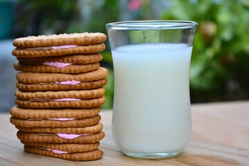 A glass of milk and cookies