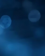 Fototapeta premium Abstract Blue Bokeh Background: Soft, Dark, and Out of Focus
