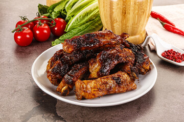 Grilled pork ribs in barbecue sauce