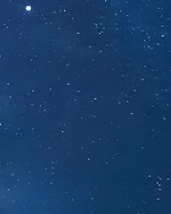 Fototapeta premium Night Sky: Dark Blue Background with Scattered White Specks