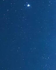 Aerial View of Scattered Objects in Dark Blue Water