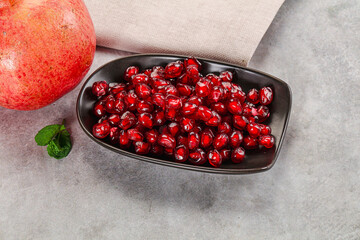 Ripe sweet red pomegranate seeds