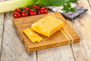 Marble yellow cheese with slices