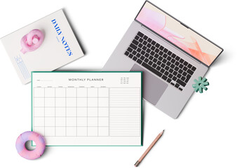 top view of laptop and planners