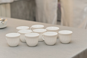 empty white clean coffee cups on the table