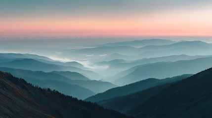 Fototapeta premium Majestic mountain landscape during twilight, showcasing layered hills under a pastel sky.