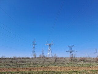 high voltage power lines in the field