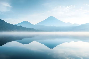 Printed kitchen splashbacks Tranquil scene of mountains reflected in a misty lake under a soft blue sky at early morning light
