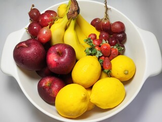 Close Up Fruits in a White Container.