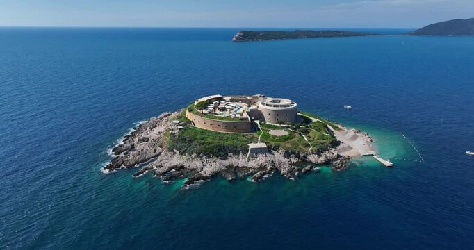 Aerial View Of Mamula Island Hotel Surrounded By The Blue Sea In Montenegro.