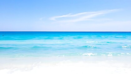 Fototapeta premium Panoramic vista of tranquil turquoise ocean and clear azure sky on a sunny day