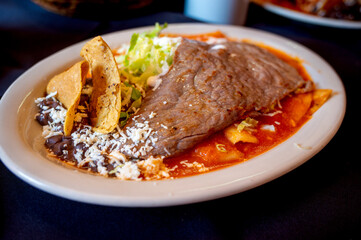 Delicious and Colorful Mexican Red Chilaquiles with Cecina De Yecapixtla