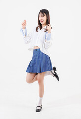 Portrait full body asian young beautiful pretty happy woman she smiles cute friendly wears white shirt blue mini skirt casual clothes standing on white background studio. Lifestyle fashion concept.