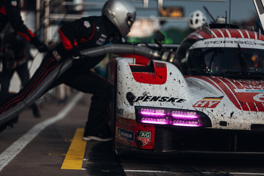 Porsche 963 Penske LMDh at the pitlane during refuel
