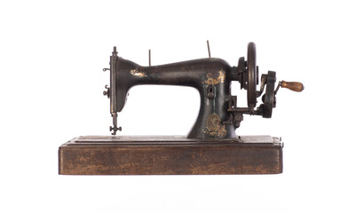black ancient sewing retro machine isolated on white background