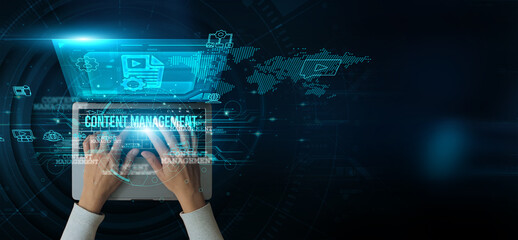 Man using a laptop with content management on the keyboard analyzes and develops various...