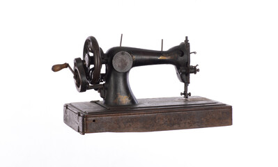 black ancient sewing retro machine isolated on white background