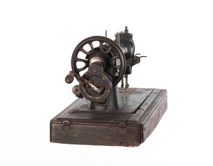 black ancient sewing retro machine isolated on white background