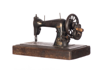 black ancient sewing retro machine isolated on white background