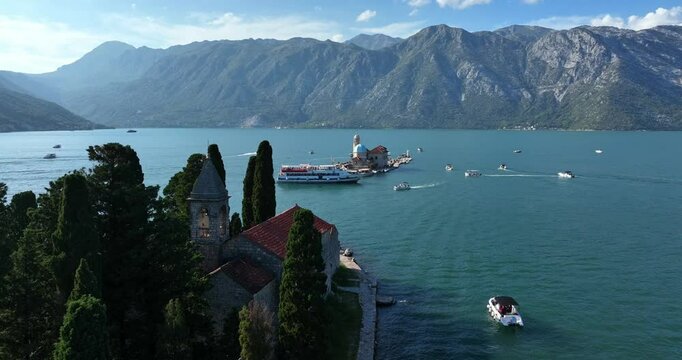 Boats Around The Our Lady of the Rocks From Saint George Monastery In Perast, Montenegro. - aerial shot