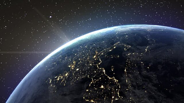 Beautiful realistic view from space of nighttime Europe with the rising sun. Lights of European cities, satellite view, on the background of stars and galaxies. Planet slowly rotating around its axis