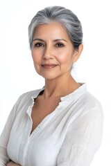 Middle-aged Latina woman, dark complexion with a calm and smiling expression. Professional portrait