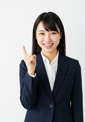 beautiful young woman wearing office clothes with expression has found an idea with hand pointing up happy face