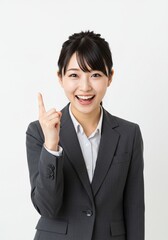 beautiful young woman wearing office clothes with expression has found an idea with hand pointing up happy face