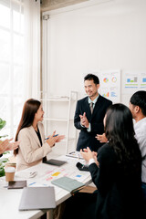 Modern youth are gathering, working as a team, and holding team meetings to achieve their goals.