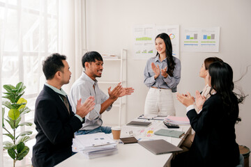 Modern youth are gathering, working as a team, and holding team meetings to achieve their goals.