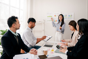 Modern youth are gathering, working as a team, and holding team meetings to achieve their goals.