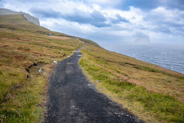 Trollkonufingur, Witch's Finger Trail in Vagar Island, Feroe Islands. Scenic, iconic landscape