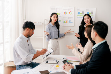 Modern youth are gathering, working as a team, and holding team meetings to achieve their goals.