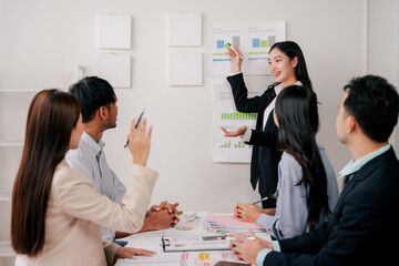 Brainstorming of young modern group. Team meeting to achieve goal. Business people discussing finance business and analysis. Teamwork concept in modern office. Calculating personal tax for client.