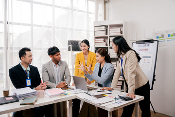 Brainstorming of young modern group. Team meeting to achieve goal. Business people discussing finance business and analysis. Teamwork concept in modern office. Calculating personal tax for client.